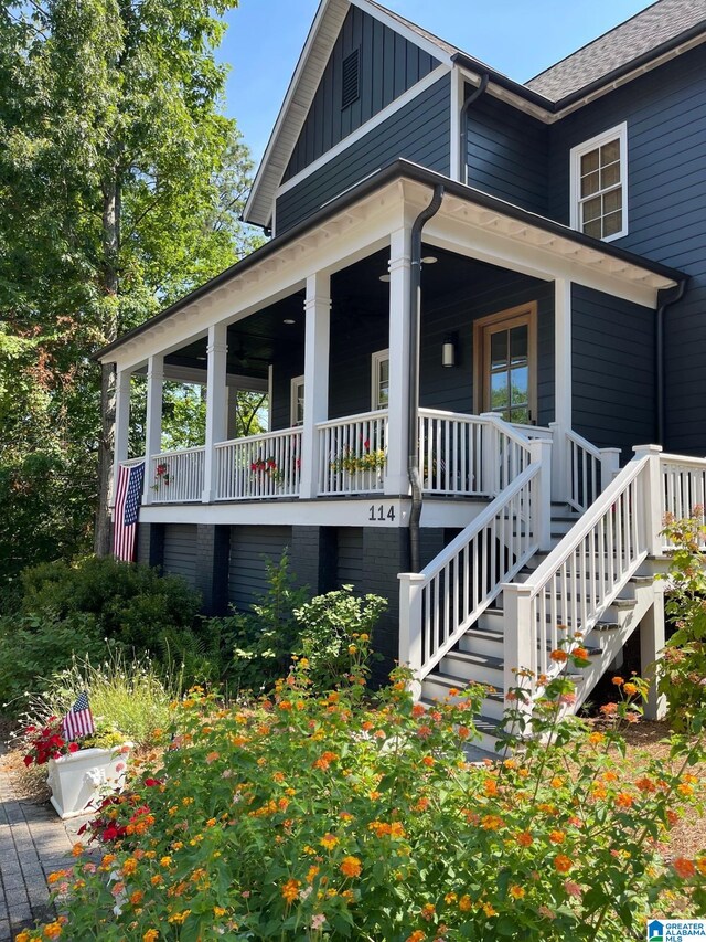 view of side of property featuring a porch