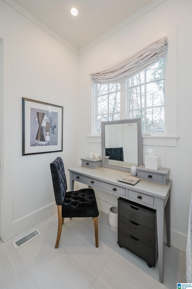 tiled office space featuring crown molding