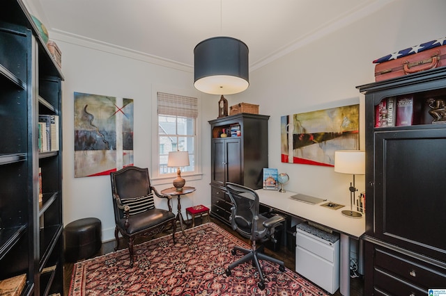 home office with dark hardwood / wood-style floors and crown molding