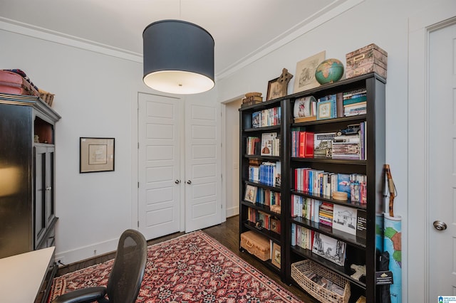 home office featuring ornamental molding and dark wood-type flooring