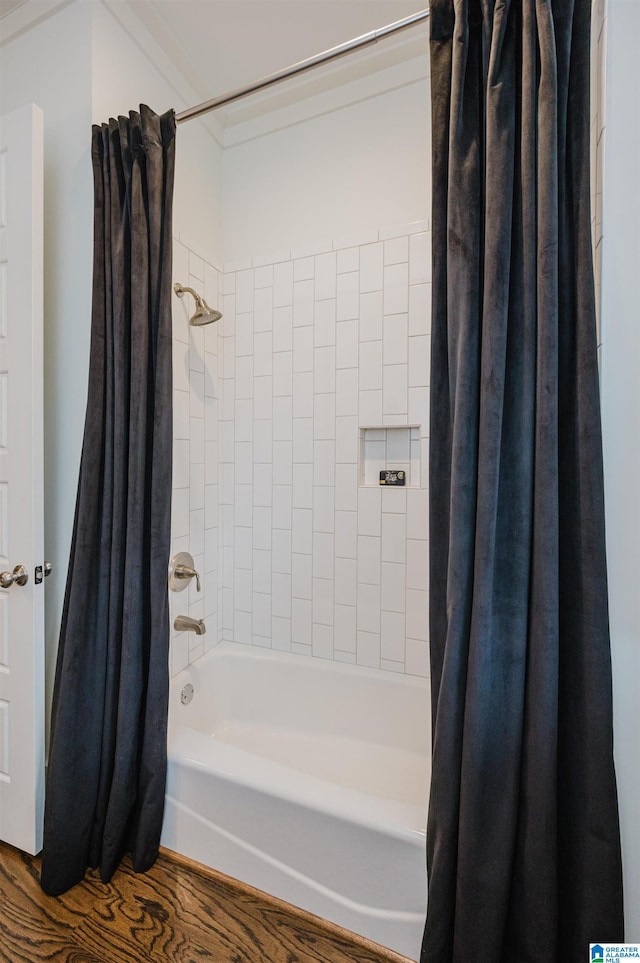 bathroom featuring shower / bathtub combination with curtain