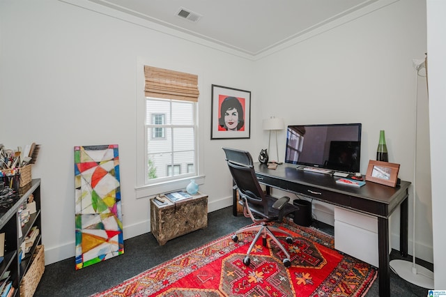 office with dark carpet and ornamental molding