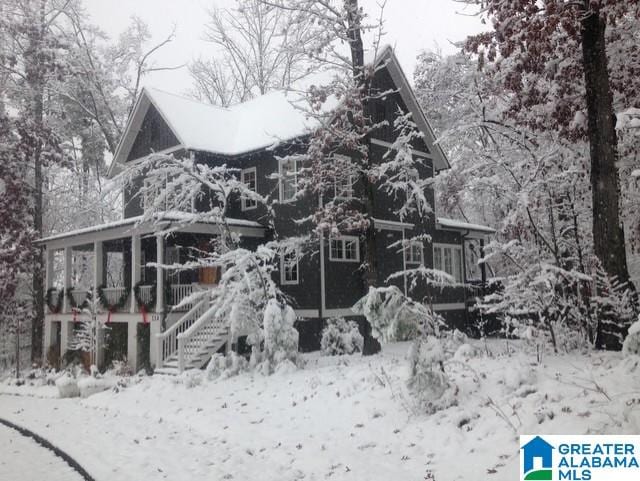 view of snow covered property