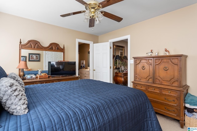 carpeted bedroom featuring ceiling fan