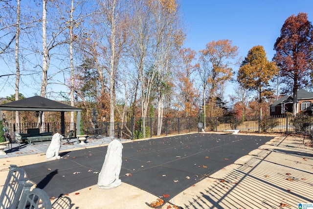 view of swimming pool with a gazebo