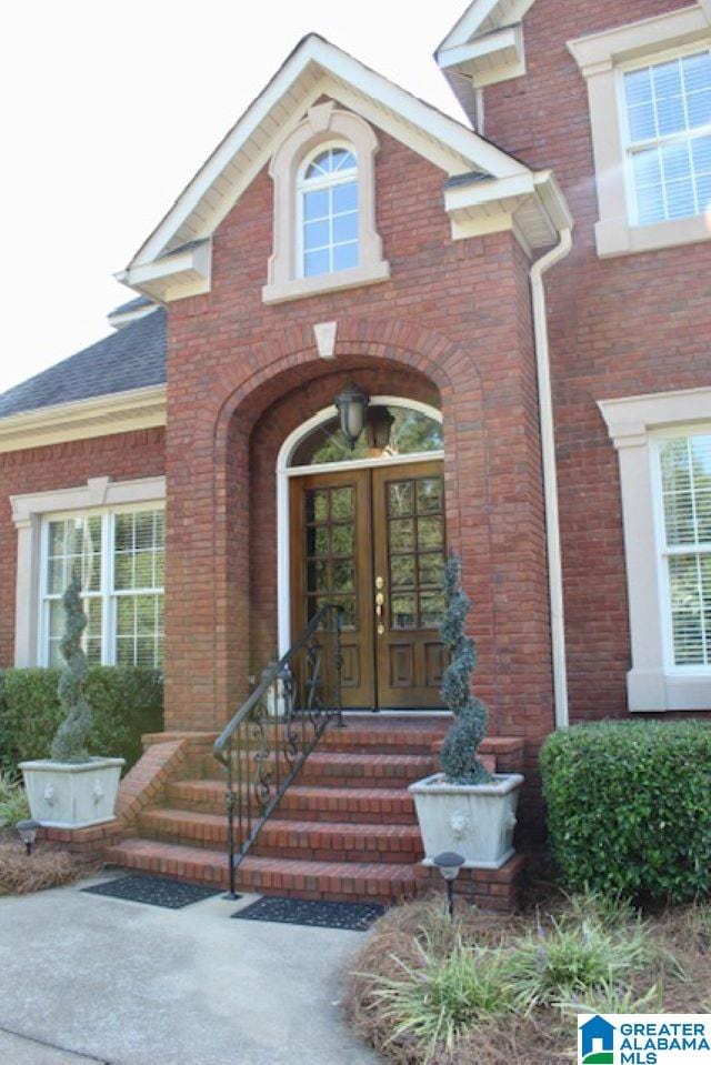 doorway to property with french doors