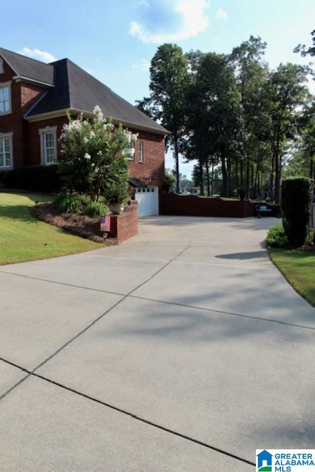 view of side of property featuring a garage