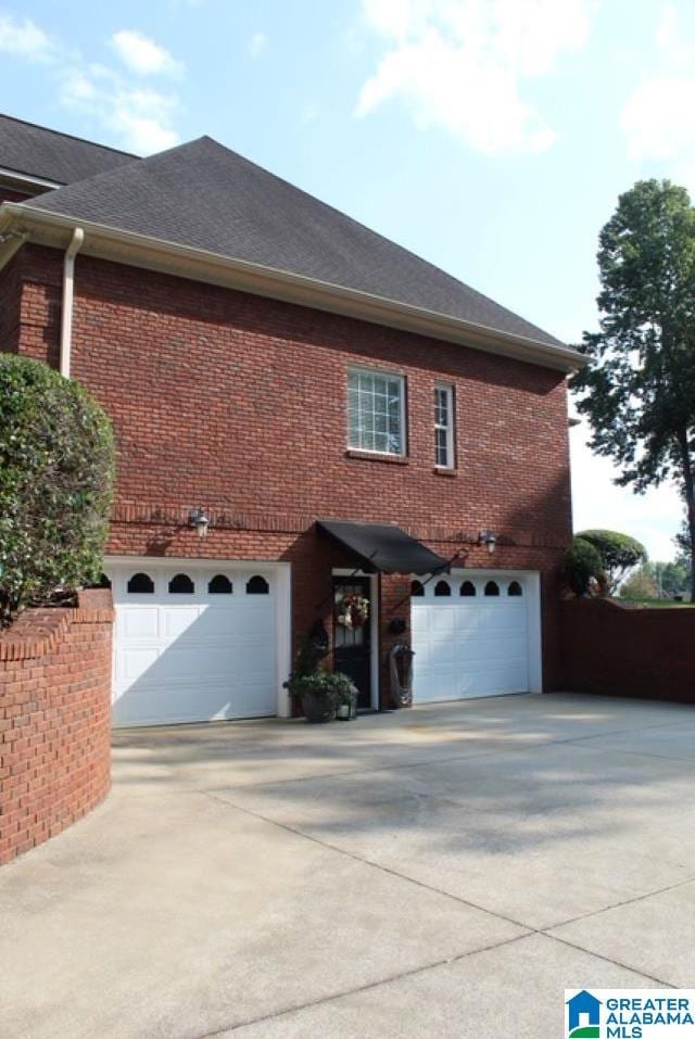 view of home's exterior with a garage