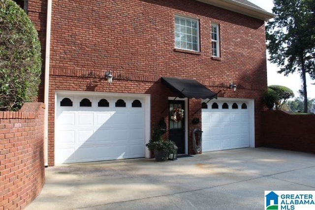 view of property exterior with a garage