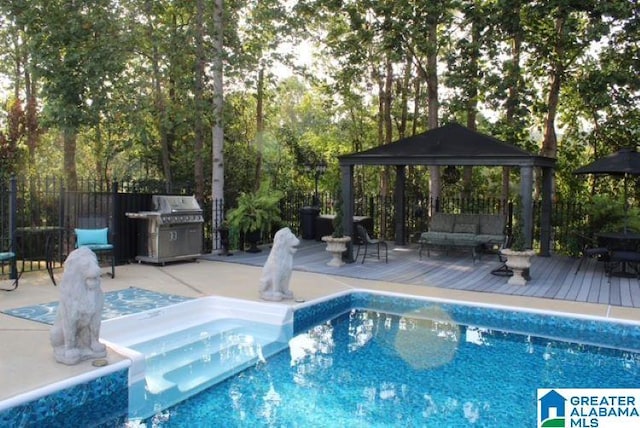 view of pool featuring a gazebo, area for grilling, an outdoor hangout area, and a deck