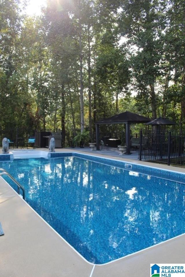 view of pool with a gazebo