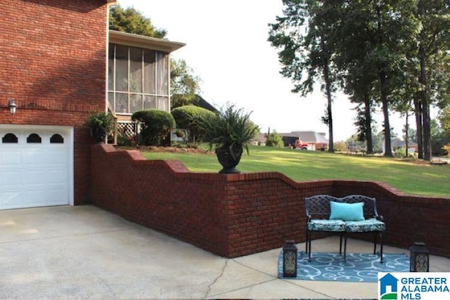 view of patio featuring a garage