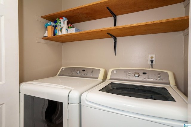 laundry room with washer and clothes dryer