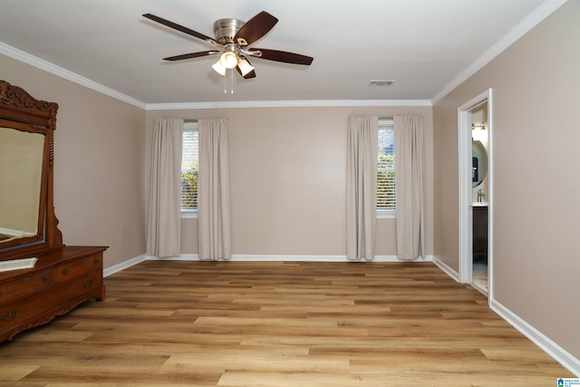 interior space with ceiling fan, light hardwood / wood-style flooring, and ornamental molding