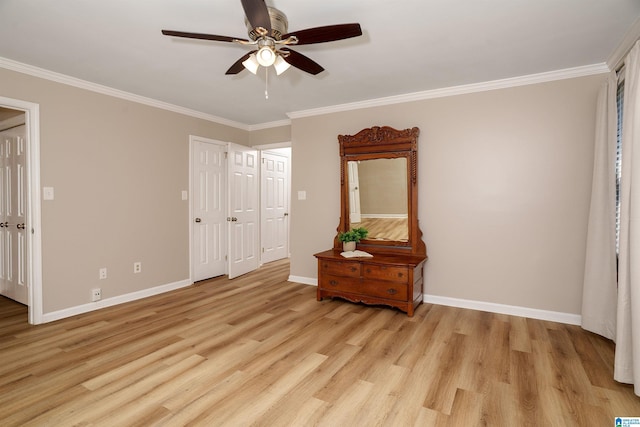 bedroom featuring ceiling fan, crown molding, and light hardwood / wood-style flooring