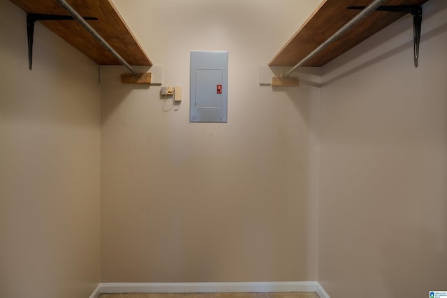 walk in closet featuring electric panel