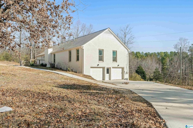 view of home's exterior featuring a garage