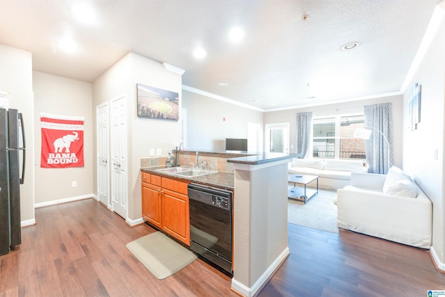 kitchen featuring dishwasher, refrigerator, sink, and dark hardwood / wood-style flooring