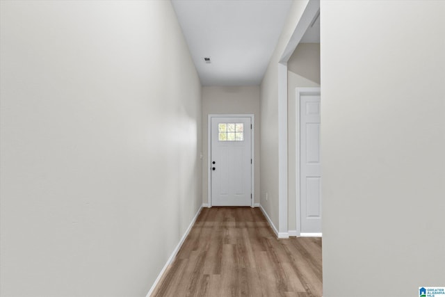 entryway with light hardwood / wood-style flooring