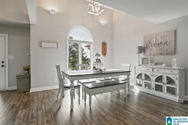 dining space featuring dark hardwood / wood-style floors