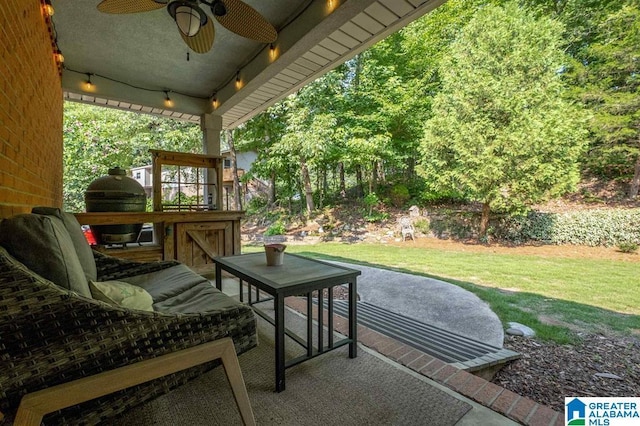 view of patio with grilling area and ceiling fan