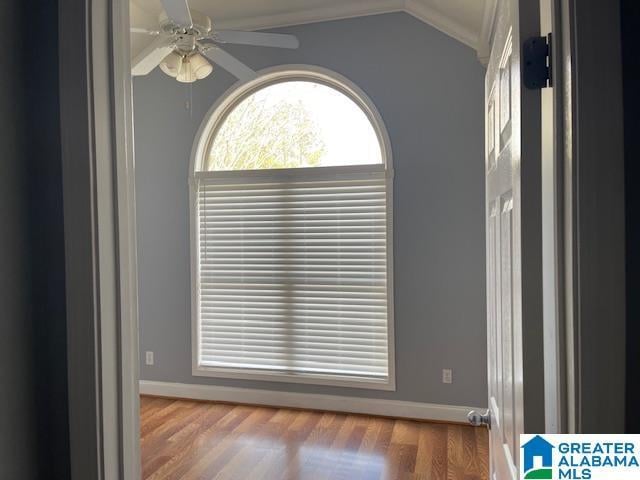 details with hardwood / wood-style flooring, ceiling fan, and crown molding