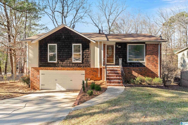 view of front of house with a garage and a front lawn