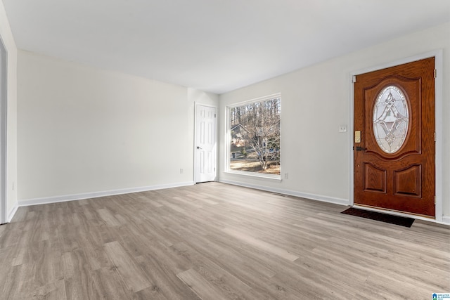 entrance foyer with light hardwood / wood-style floors