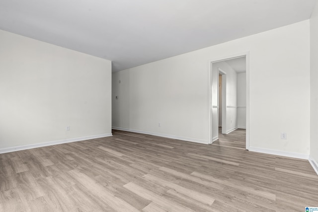 empty room with light wood-type flooring