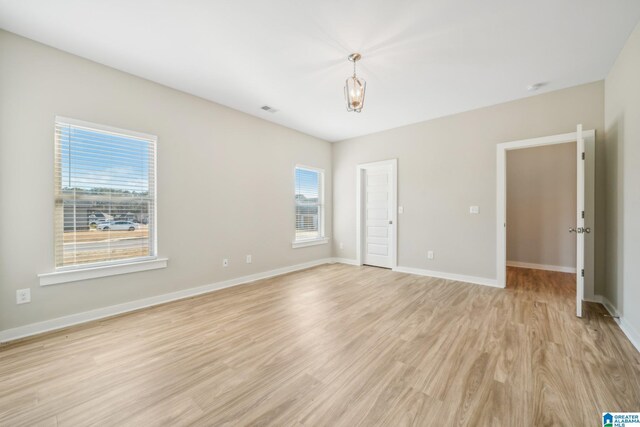 unfurnished bedroom with light hardwood / wood-style flooring