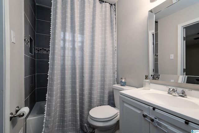 full bathroom with shower / tub combo, vanity, and toilet