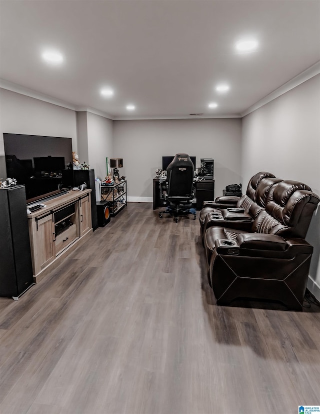 living room featuring hardwood / wood-style floors and ornamental molding