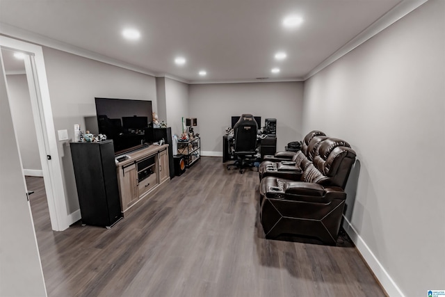 living room with dark hardwood / wood-style flooring and ornamental molding