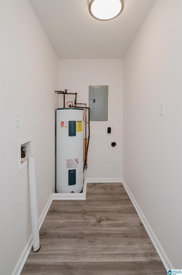 utility room with water heater and electric panel