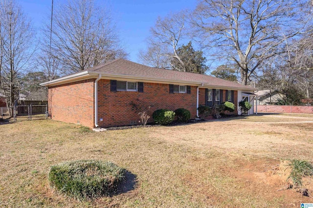 view of property exterior with a lawn