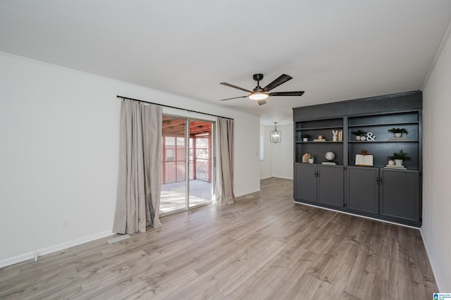 unfurnished room featuring ceiling fan and light hardwood / wood-style floors