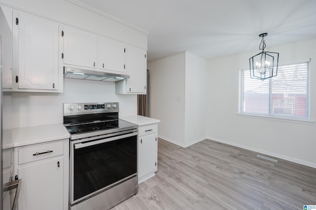 kitchen with an inviting chandelier, decorative light fixtures, electric stove, white cabinets, and light hardwood / wood-style flooring