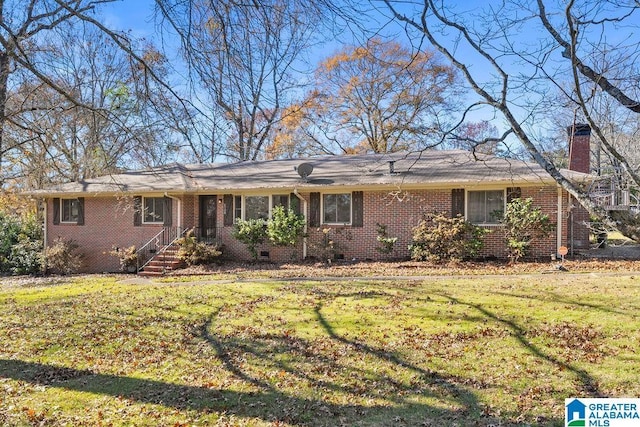 ranch-style house featuring a front lawn