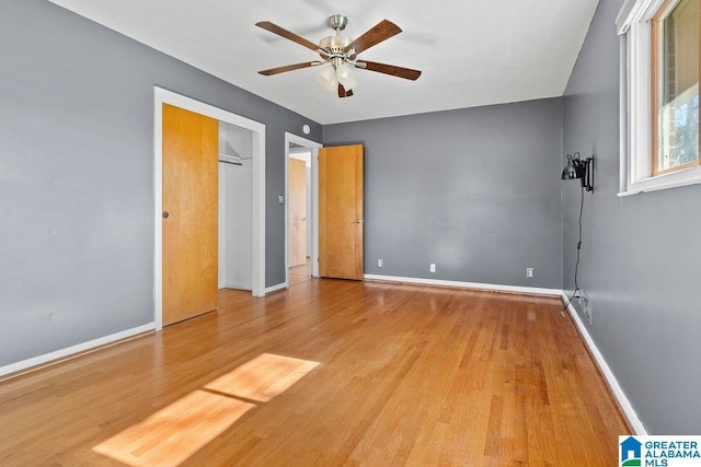 unfurnished bedroom featuring light hardwood / wood-style floors and ceiling fan