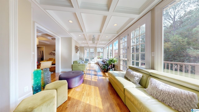 sunroom featuring beamed ceiling and coffered ceiling