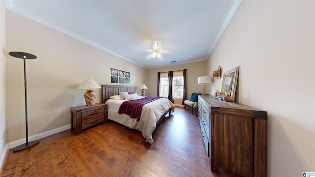 bedroom featuring ceiling fan, dark hardwood / wood-style flooring, and ornamental molding