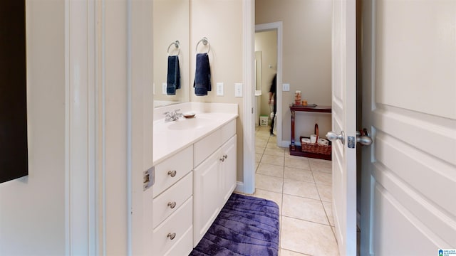 bathroom featuring tile patterned floors and vanity