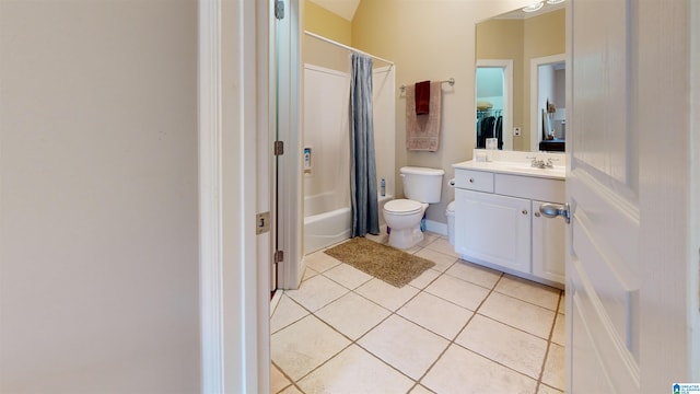 full bathroom featuring toilet, shower / bath combo, vanity, and tile patterned floors