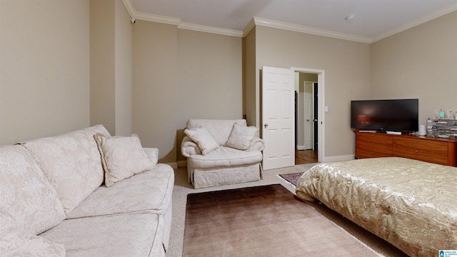 bedroom with carpet floors and ornamental molding