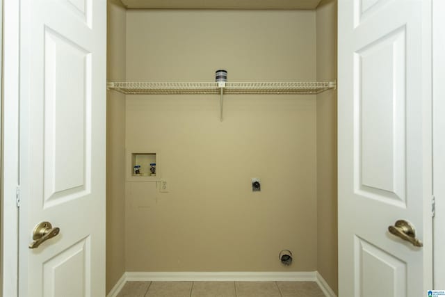 laundry room featuring light tile patterned flooring, hookup for a washing machine, and electric dryer hookup