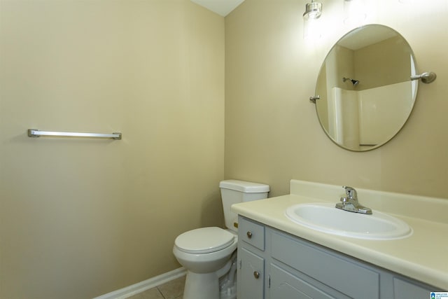 bathroom with a shower, tile patterned floors, toilet, and vanity