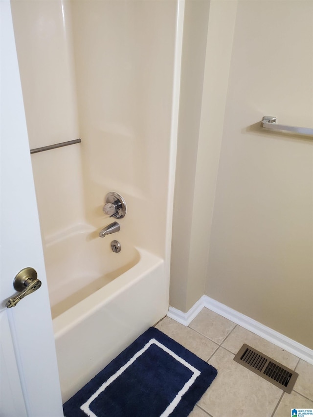 bathroom featuring shower / bathing tub combination and tile patterned floors