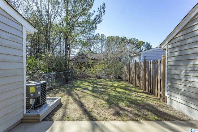 view of yard featuring central air condition unit