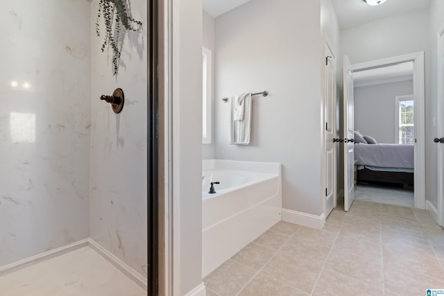 bathroom featuring a tub to relax in