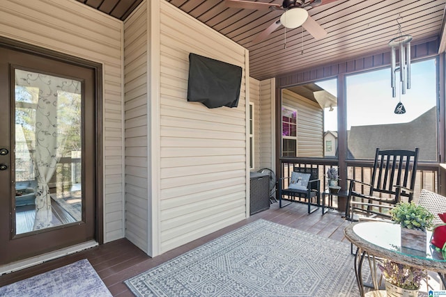 exterior space featuring covered porch and ceiling fan